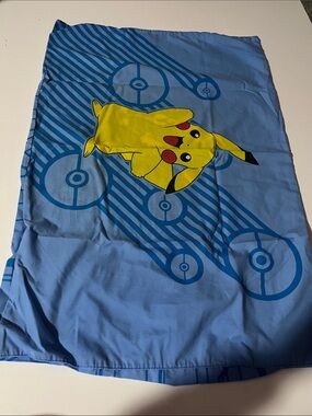 Pokemon Yellow Pikachu Pillowcase on Blue Pokeball Design